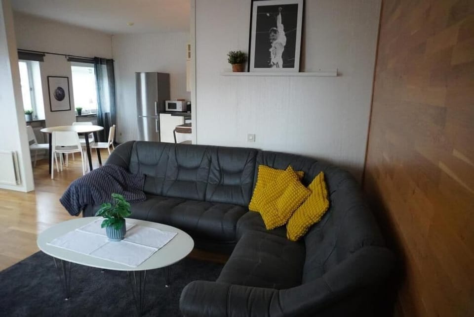 Apartment, City View | Living area | Flat-screen TV