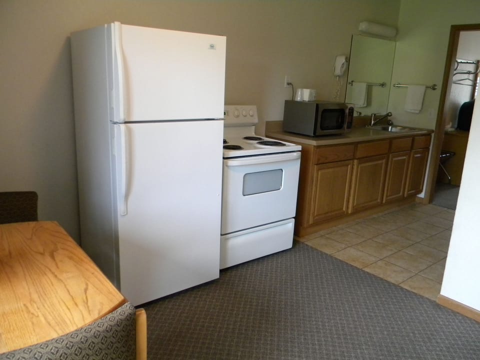 Premium Suite, 2 Double Beds, Accessible, Kitchen | Private kitchen | Coffee/tea maker, fridge, microwave, highchair