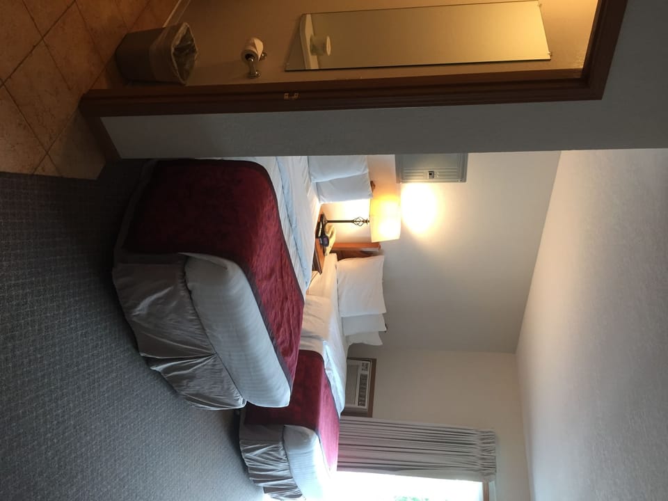 Signature Room, 2 Queen Beds, Refrigerator & Microwave, Pool View | Premium bedding, desk, soundproofing, iron/ironing board