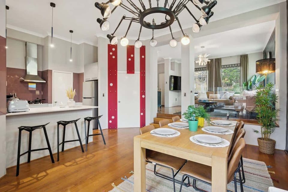 Where bold patterns meet cozy gatherings — a dining space made for long dinners and even longer conversations. 🍽️✨