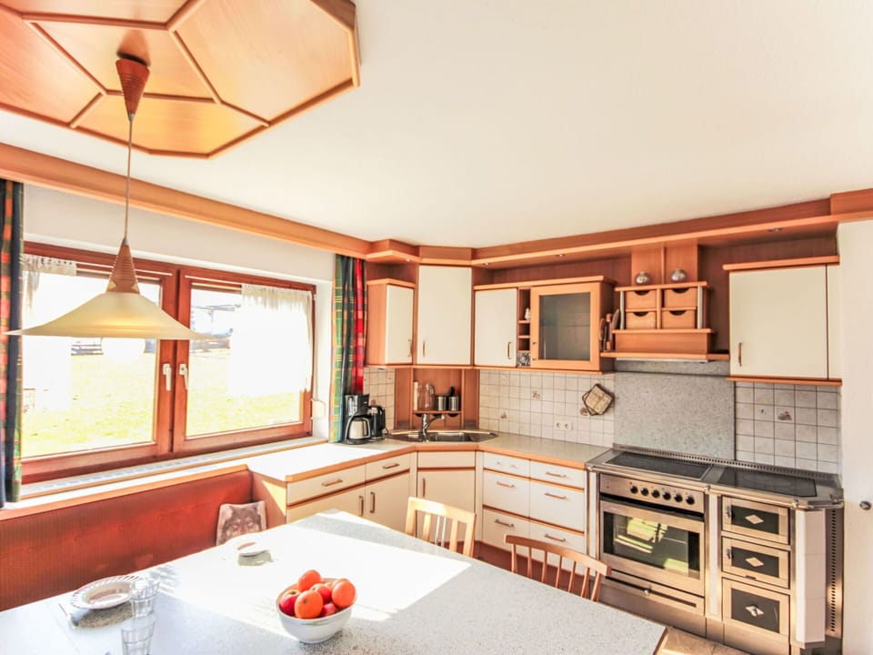 Interior Design, Wood, Ceiling, Kitchen, Flooring, Floor, Light Fixture, Furniture, Countertop, Cabinetry