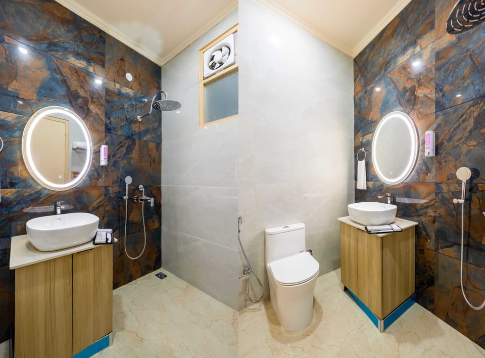 Executive Room | Bathroom | Shower, towels, soap, shampoo