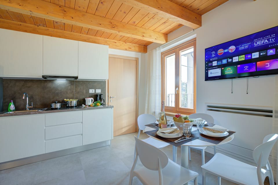Family Apartment, Multiple Bedrooms (Residenza Lugana - Apt 3) | Private kitchen | Fridge, microwave, stovetop, coffee/tea maker