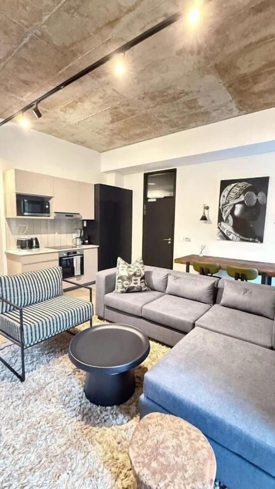 Luxury Apartment, Balcony, City View | Living area | Flat-screen TV