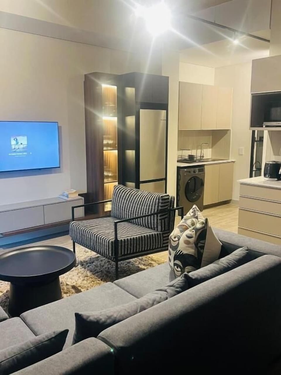 Luxury Apartment, Balcony, City View | Living area | Flat-screen TV