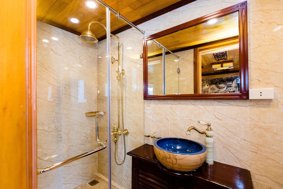 Deluxe Triple Room, Sea View | Bathroom | Shower, rainfall showerhead, designer toiletries, hair dryer