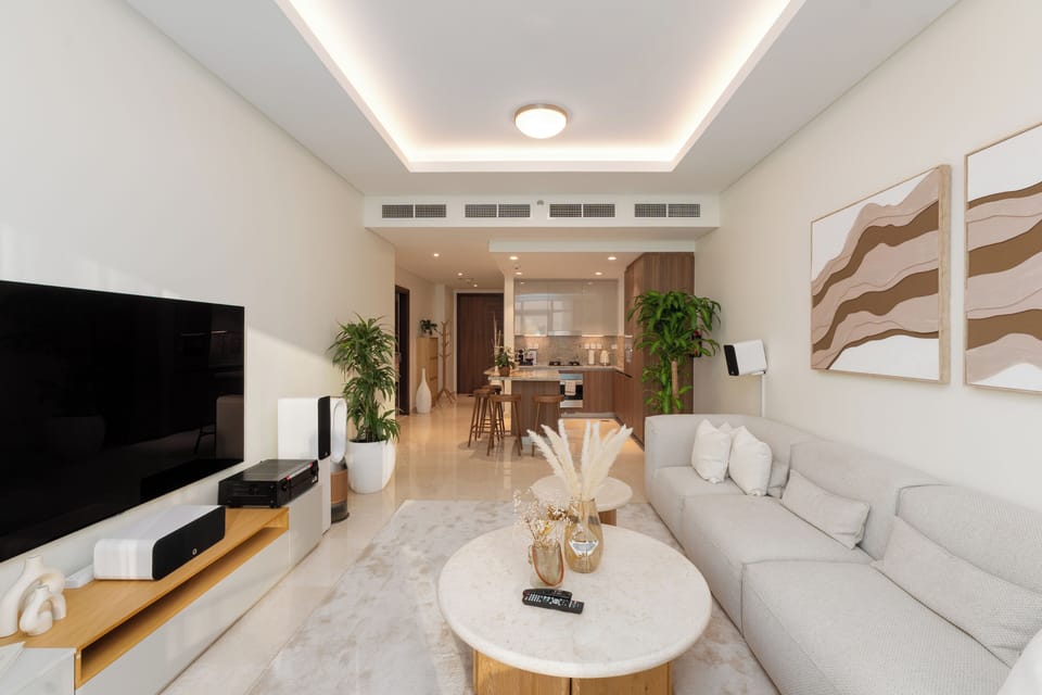 Deluxe Apartment, Balcony, City View | Living area | TV