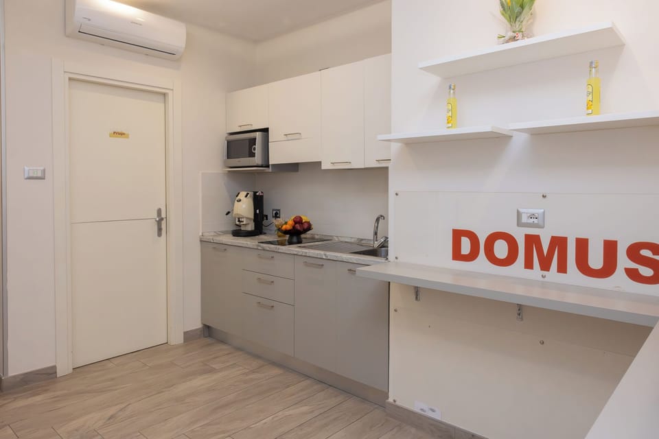 Mini-fridge, microwave, espresso maker, coffee/tea maker