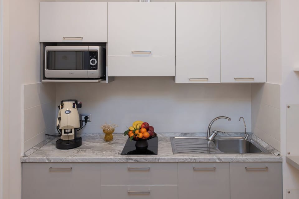 Mini-fridge, microwave, espresso maker, coffee/tea maker