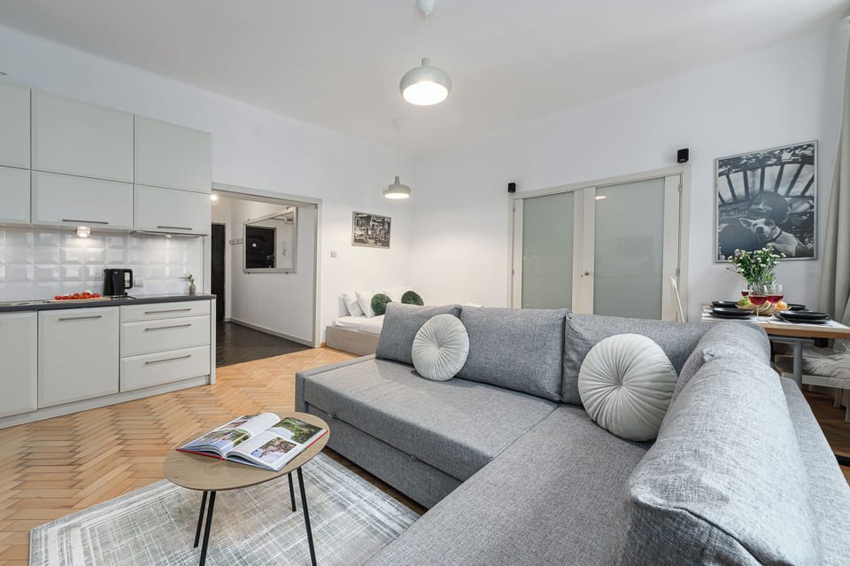 Classic Apartment, Courtyard View | Living area | 40-inch LCD TV with digital channels