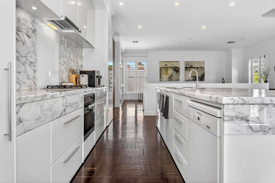 Fully equipped kitchen with marble countertops