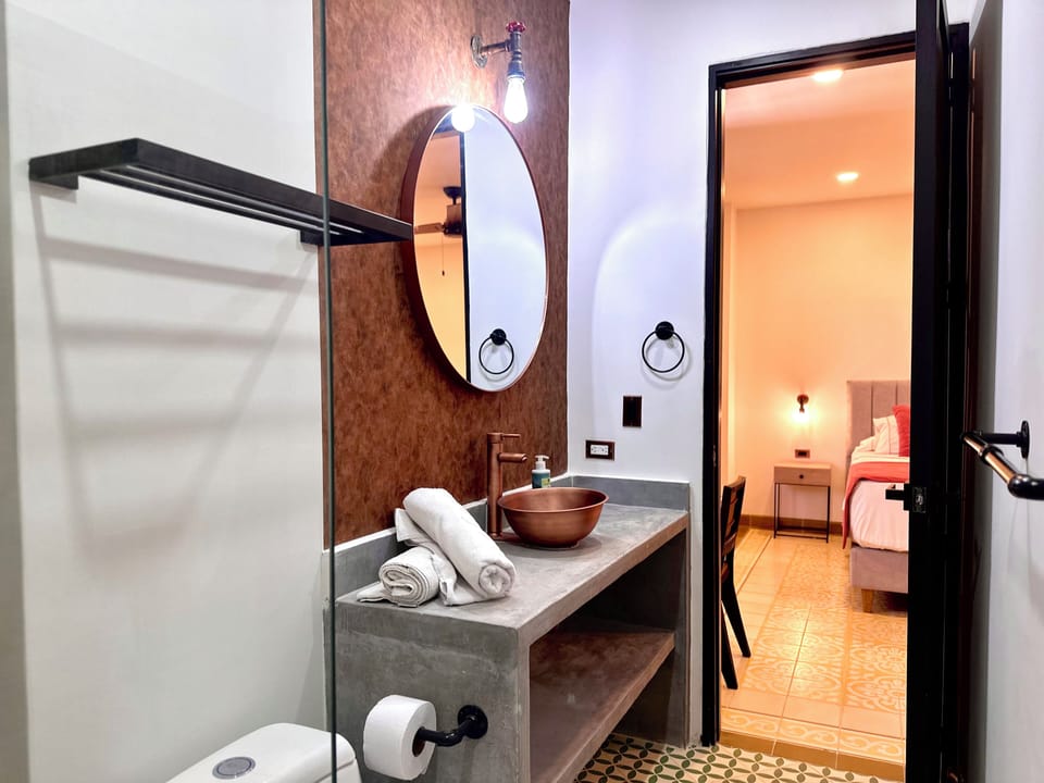 Standard Double Room | Bathroom | Shower, towels, soap, shampoo