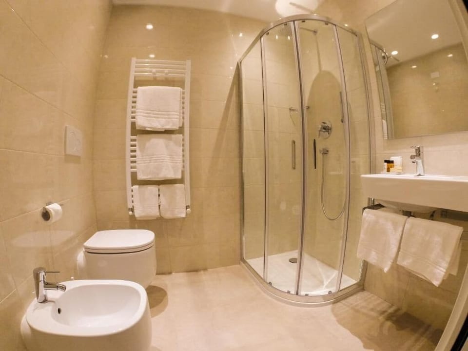 Comfort Triple Room, Partial Sea View | Bathroom | Shower, hair dryer, towels, toilet paper