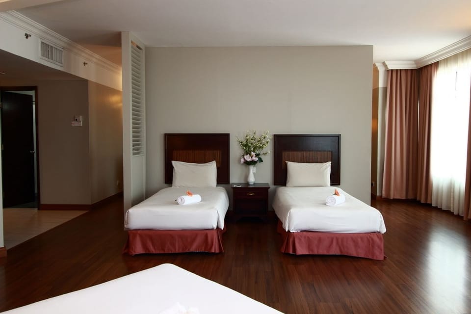 Family Suite | In-room safe, desk, blackout drapes, iron/ironing board (on request)