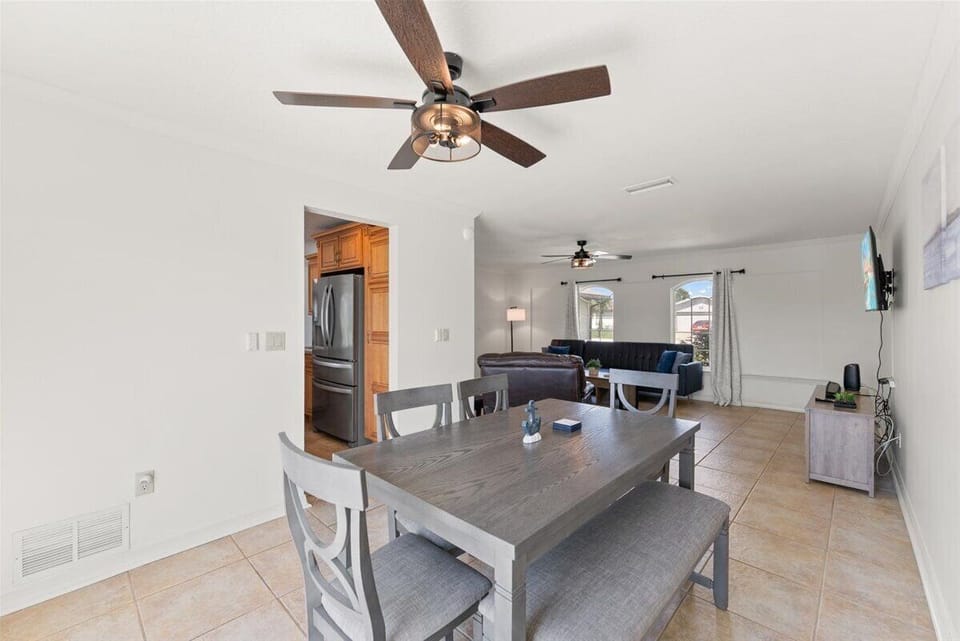 An open-concept space perfect for meals, games, and shared moments.