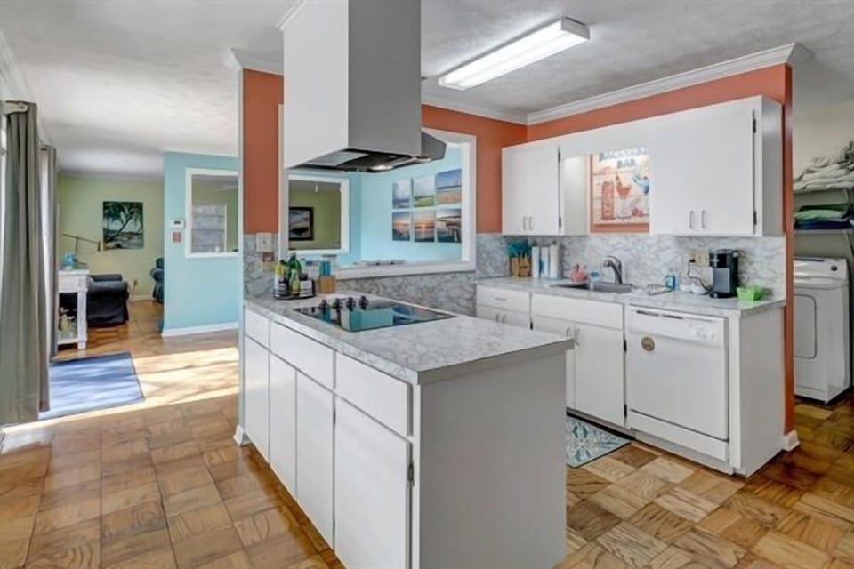 Open kitchen layout with ample counter space-great for meals, snacks, and shared moments.
