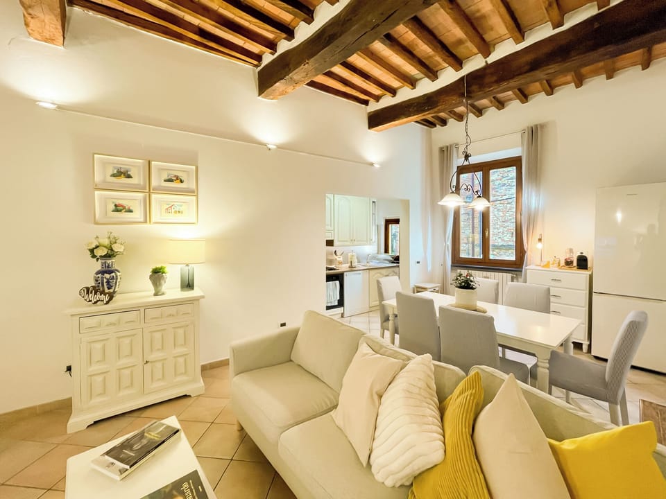 Deluxe Apartment, 2 Bedrooms, Balcony, City View | Living area | Flat-screen TV
