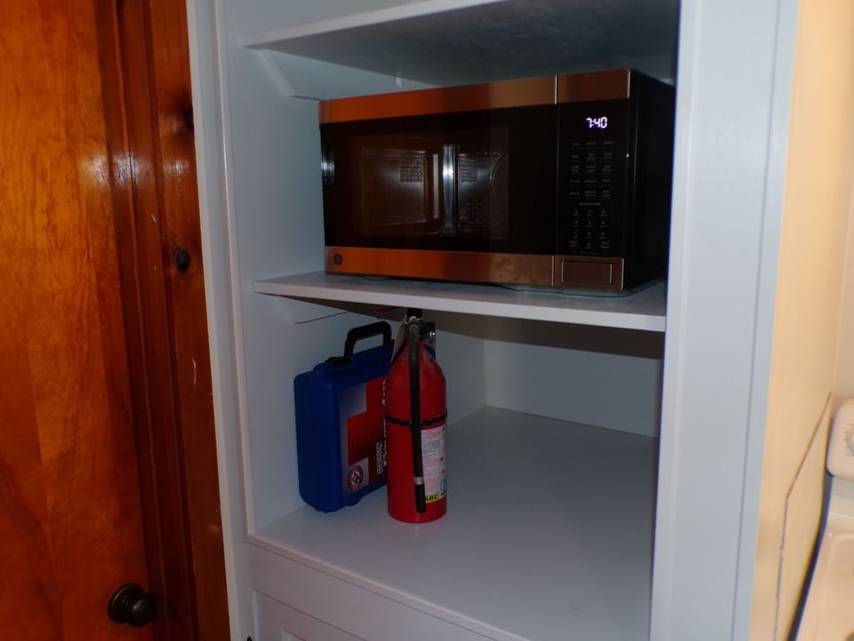 Microwave, First Aid Kit, Fire Extinguisher provided.