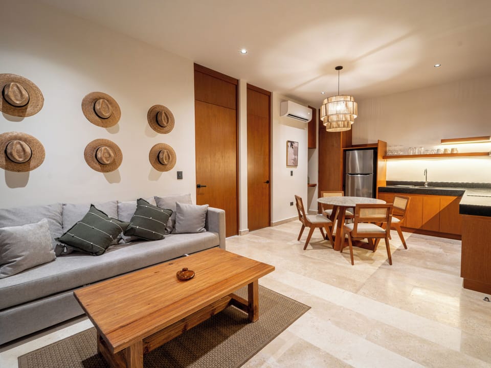 Superior Suite | Living area | 50-inch flat-screen TV with digital channels