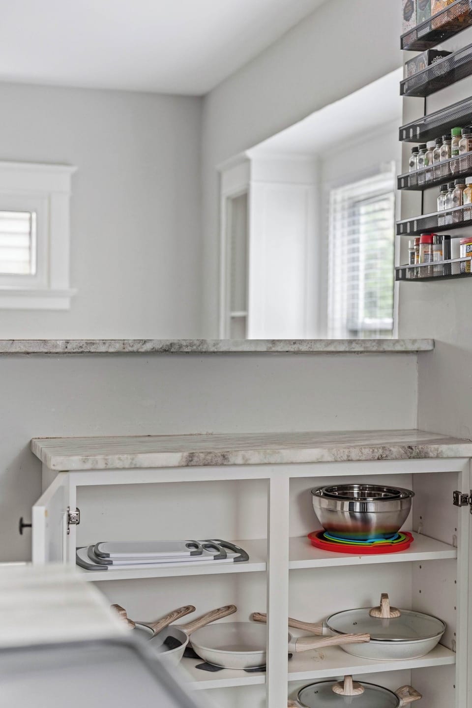 Pantry area w/ built-in shelves for organized storage