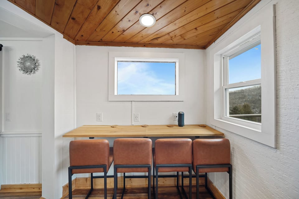 Custom Wood Bar Adjacent to the Kitchen