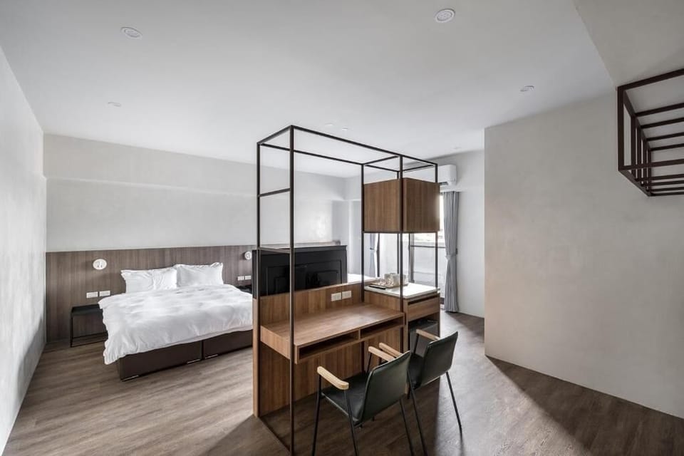 Deluxe Quadruple Room, Balcony, City View | Desk, blackout drapes, free WiFi, wheelchair access