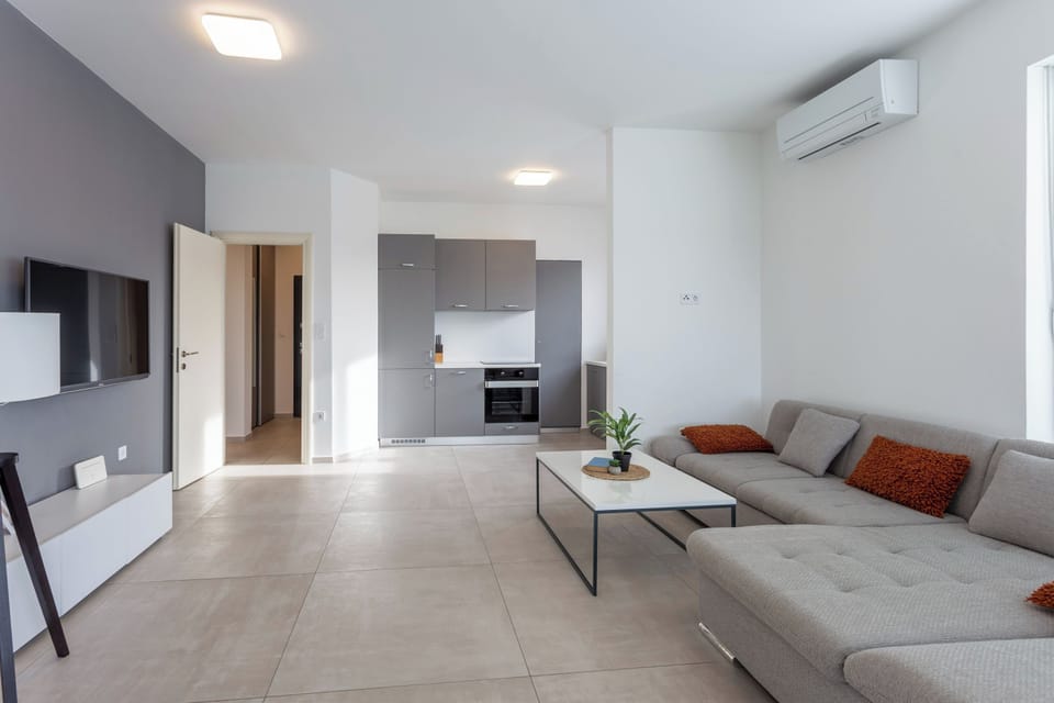Standard Apartment, 2 Bedrooms, Balcony (Apartment Sang Near The Beach) | Living area | Smart TV