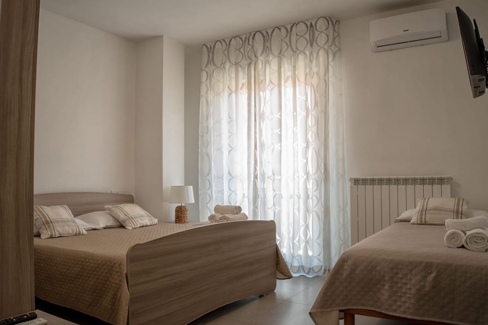 Comfort Room | Desk, laptop workspace, blackout drapes, soundproofing