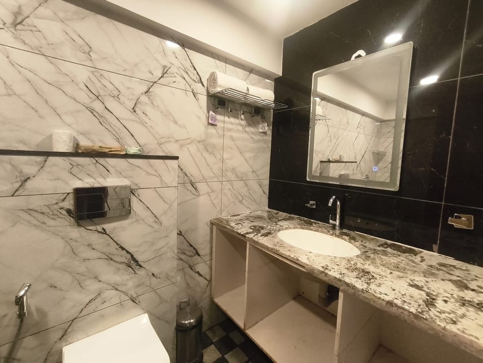 Shower, bidet, towels, soap