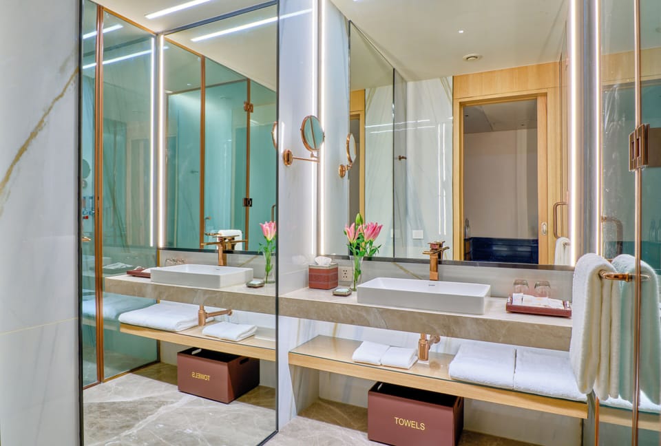 Shower, free toiletries, hair dryer, slippers