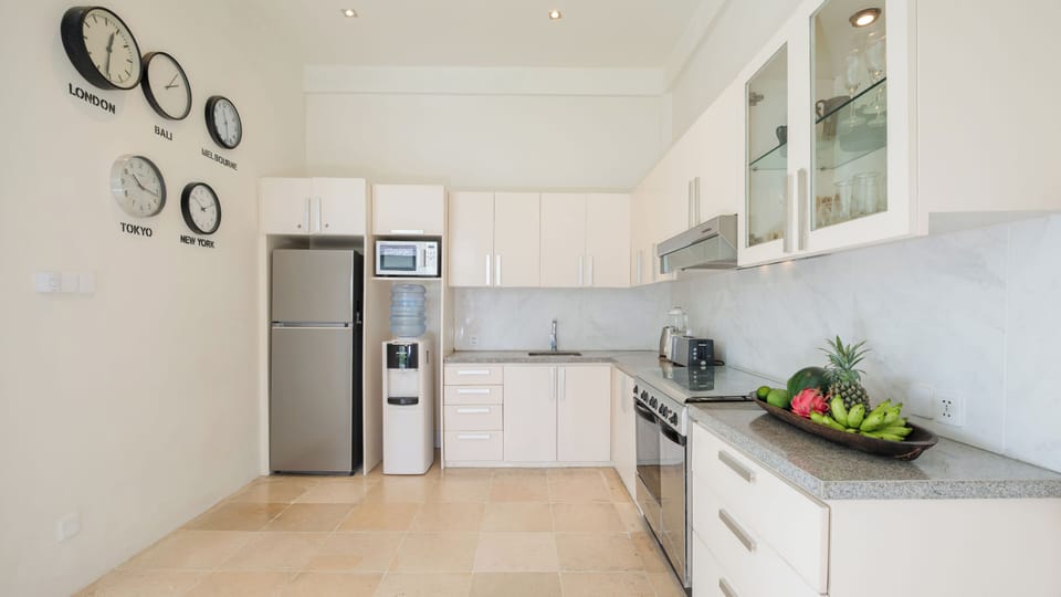 Villa | Private kitchen | Fridge, microwave, oven, stovetop