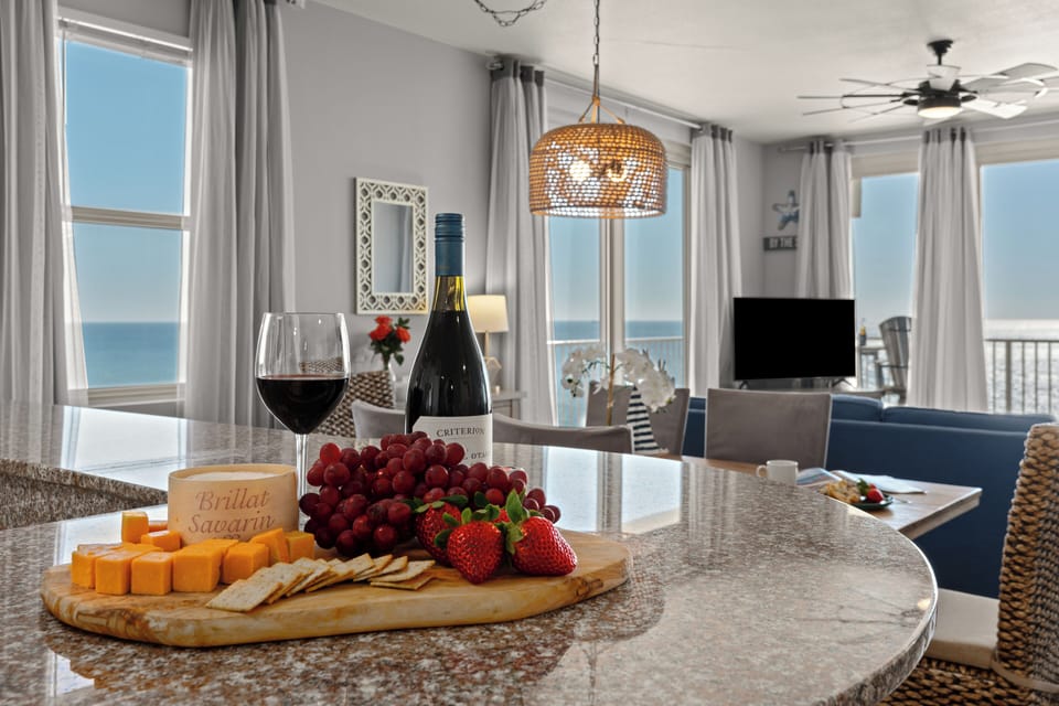 Gourmet kitchen detail featuring the breakfast bar and coastal accents.