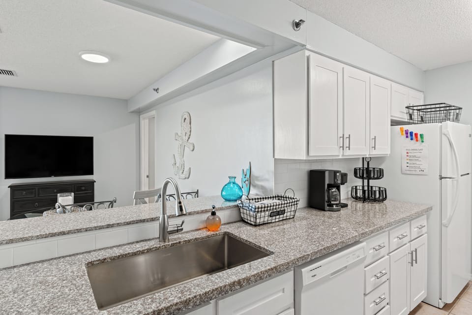 Countertop view showing the coffee maker and ample prep space.