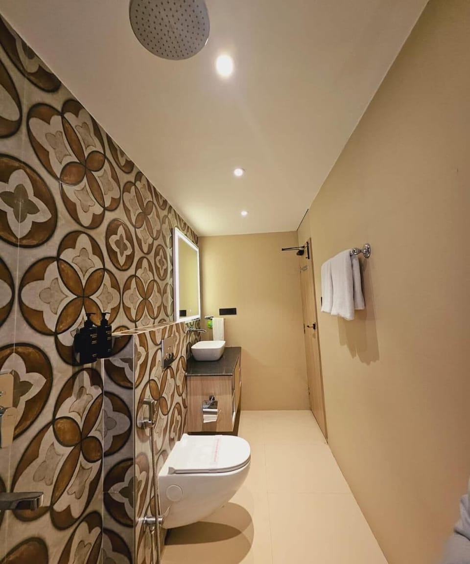 Shower, slippers, towels, soap