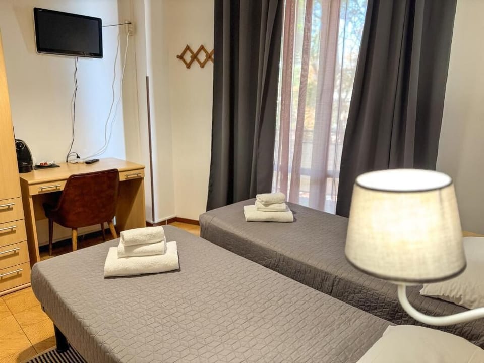 Standard Twin Room, Balcony, City View | In-room safe, desk, laptop workspace, blackout drapes