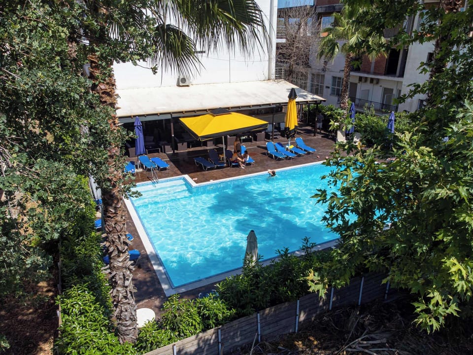 Enjoy our spacious pool and garden area, ideal for cooling off on hot days, sunbathing, or unwinding after sightseeing. A great base for beach day trips like Marini Beach
