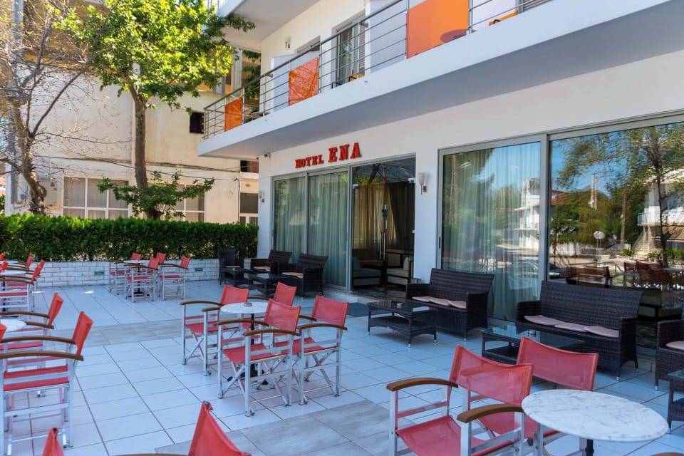 Enjoy the front patio seating area, perfect for sipping coffee, chatting with friends, or simply soaking up the relaxed atmosphere in a welcoming outdoor space