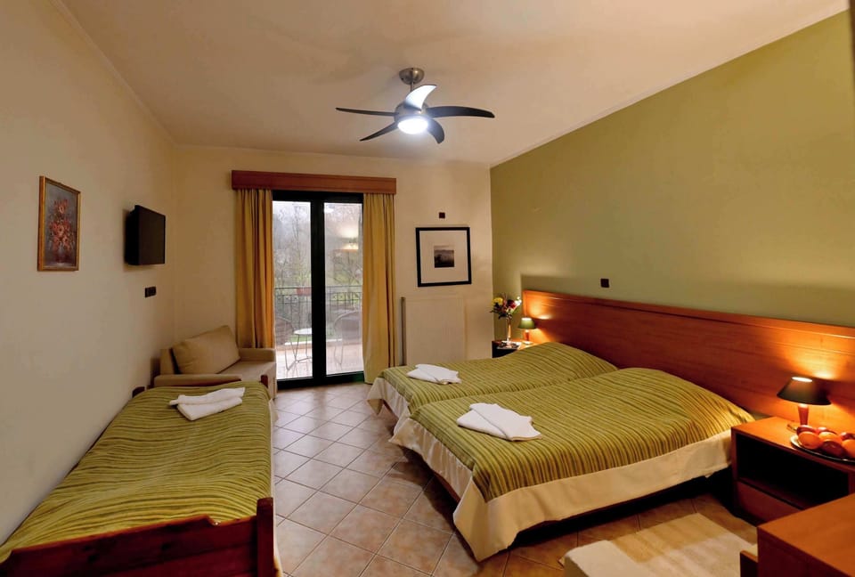 Cozy Guest Bedroom with Balcony Access and Natural Light