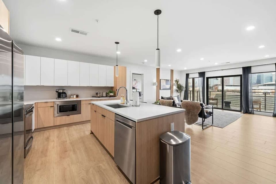 Integrated dishwasher and modern fixtures for a hassle-free experience.