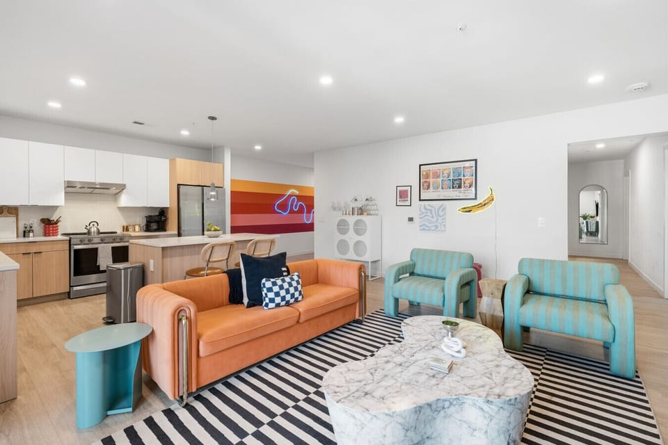 Walk to downtown from this bright open-concept living room