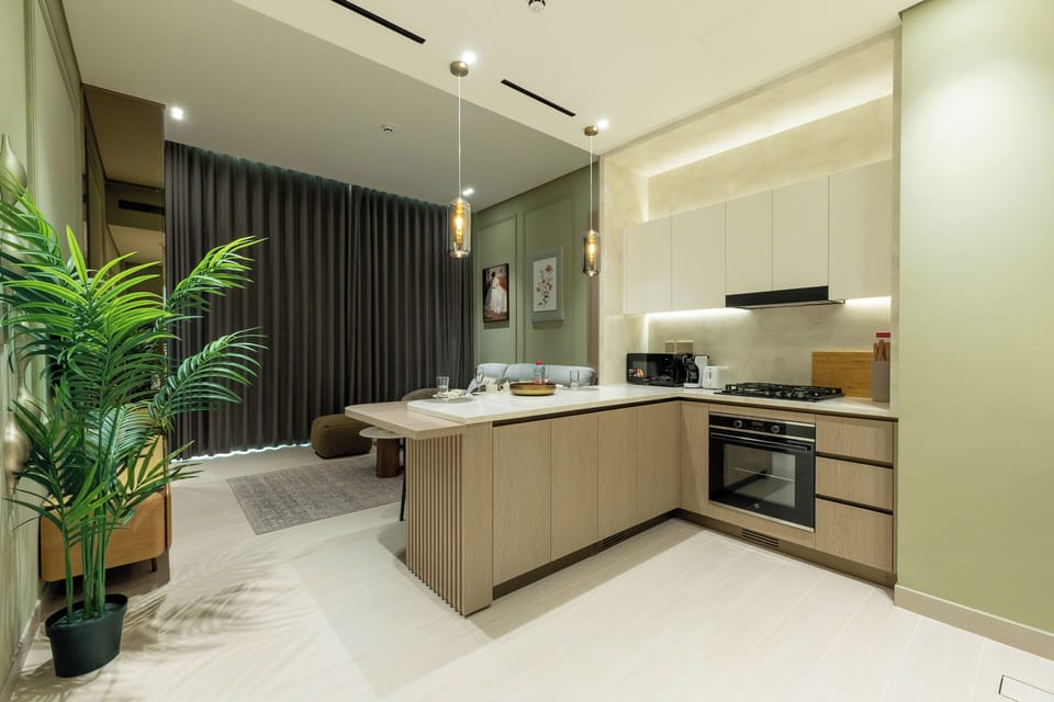 Deluxe Apartment, Balcony, City View | Private kitchen | Fridge, microwave, oven, stovetop