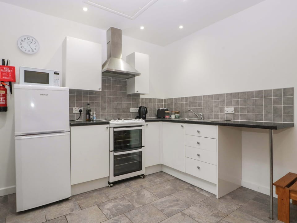 Fridge, microwave, toaster, cookware/dishes/utensils