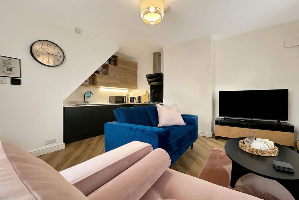 The living area opens to the kitchen, giving you the perfect setup for relaxed mornings.
