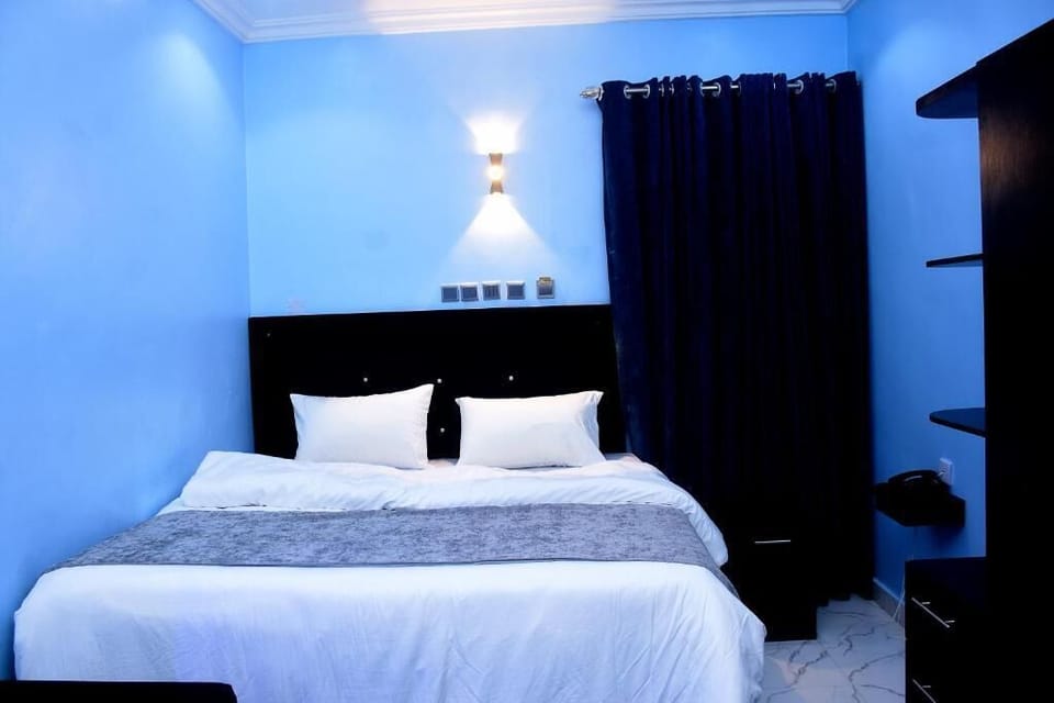 Family Room, Balcony, City View | Desk, laptop workspace, blackout drapes, soundproofing