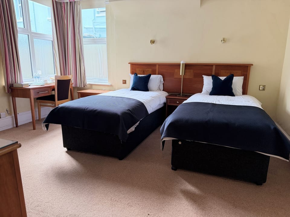 Classic Twin Room | In-room safe, desk, laptop workspace, iron/ironing board