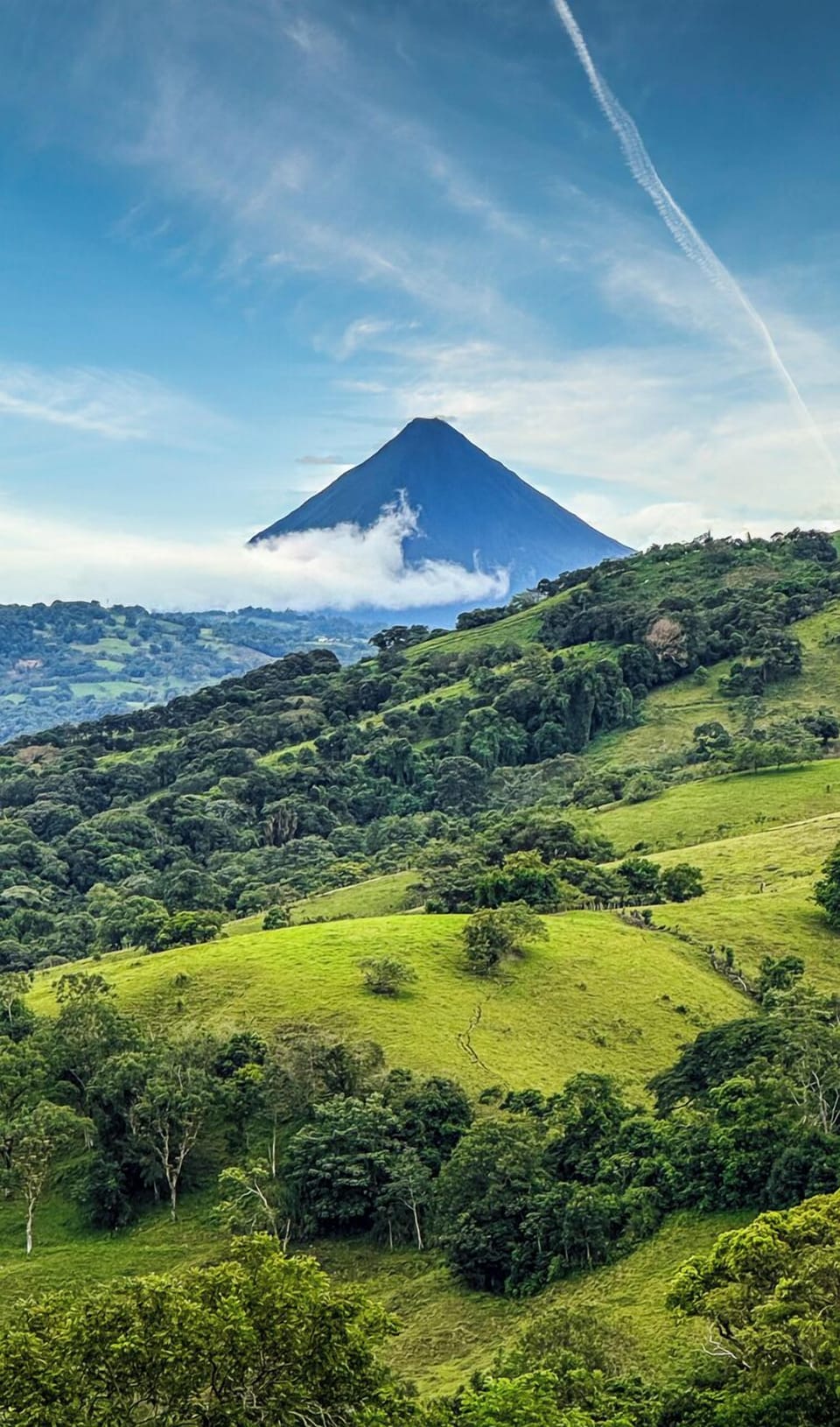 The volcano peeks out and is visible throughout the day within our beautiful community.