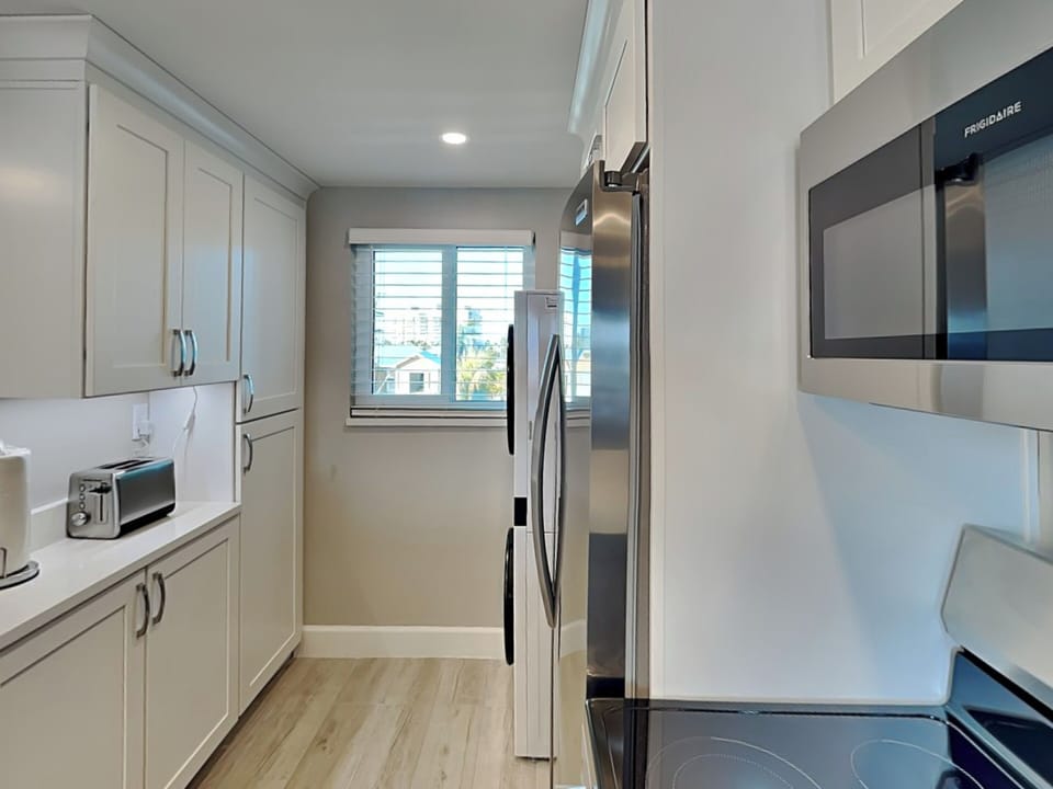 Fully Equipped Kitchen with Stainless Steel Appliances