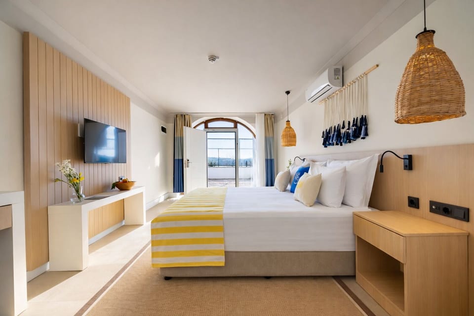 Deluxe Double or Twin Room, Terrace, Beachfront | Premium bedding, minibar, free WiFi, bed sheets