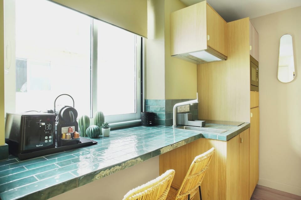 Apartment | Private kitchen | Cleaning supplies