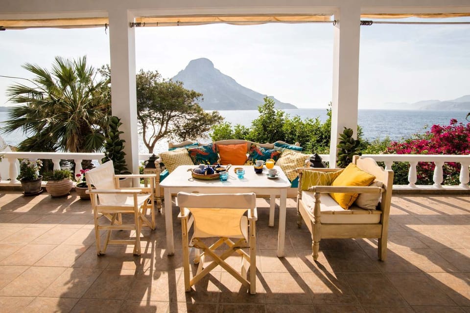 Scenic Veranda with Outdoor Dining and Panoramic Sea View